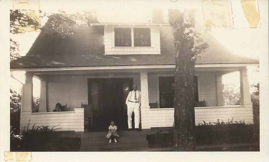 Original owner G.W. Johnson, granddaughter, and housekeeper in 1938.