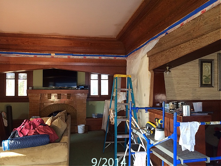 Looking towards the inglenook shows the future wall color. Some stripped, unfinished wood, and some of the future work